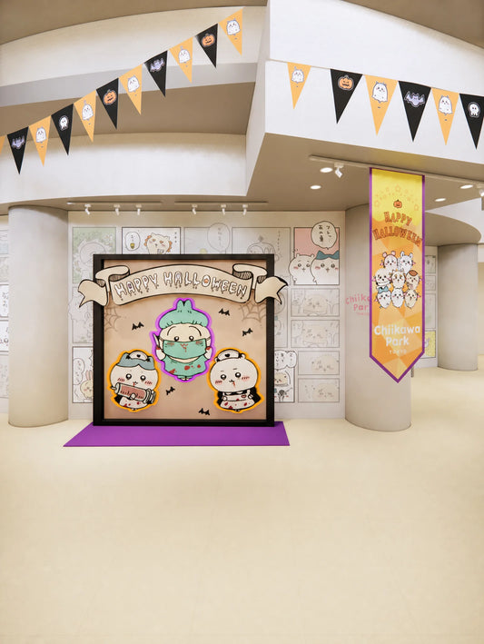 Halloween photo spot at Chiikawa Park with Happy Halloween bunting, a framed backdrop and Chiikawa characters dressed as ghosts