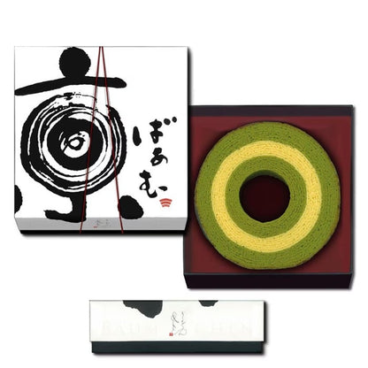 Kyo Baum gift box with calligraphy design and open box showing matcha baumkuchen