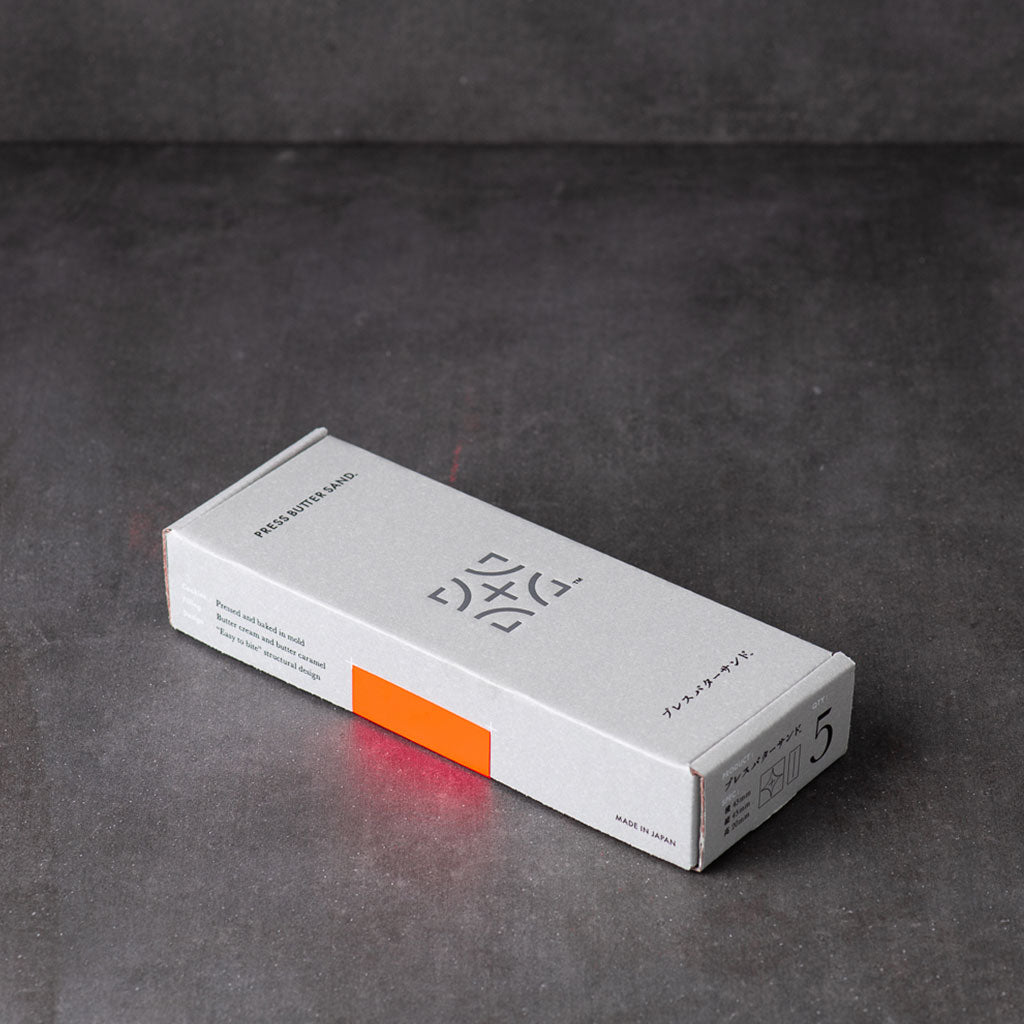 PRESS BUTTER SAND box exterior with product details