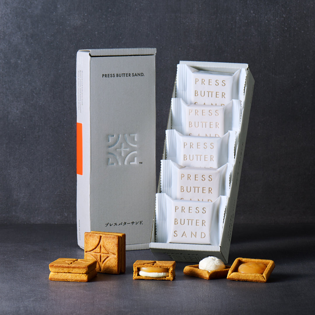 PRESS BUTTER SAND 5-piece box with butter sandwiches showing cream and caramel filling