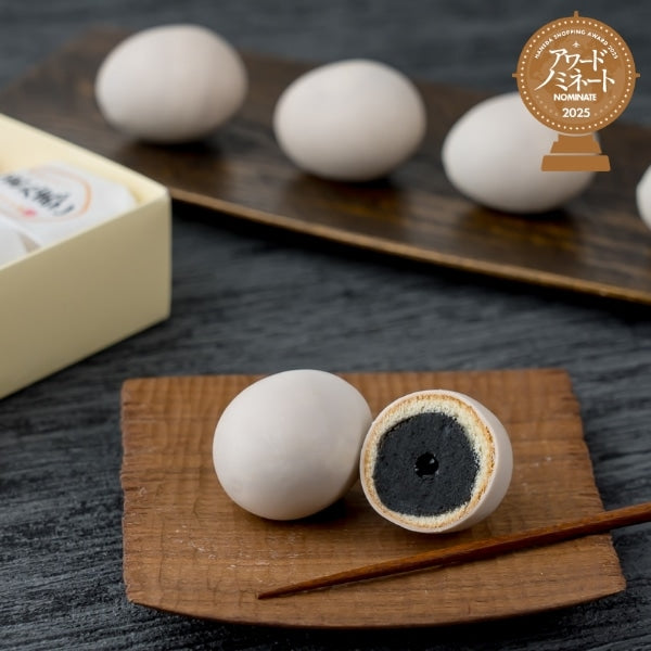 Tokyo Tamago Goma Tamago black sesame egg cakes with cross-section showing sesame filling